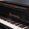 polished black Bosendorfer 214VC grand piano keyboard