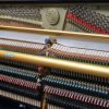 polished black kawai K-6 upright piano interior