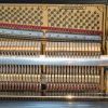 polished black steinway model z upright piano with grand piano style lid interior
