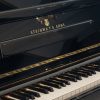 polished black steinway model z upright piano with grand piano style lid keyboard