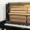 Yamaha Mode UX1 upright piano in polished black