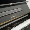 Yamaha Mode UX1 upright piano in polished black