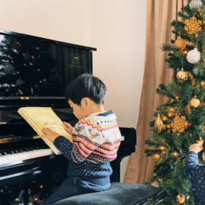 kid at piano