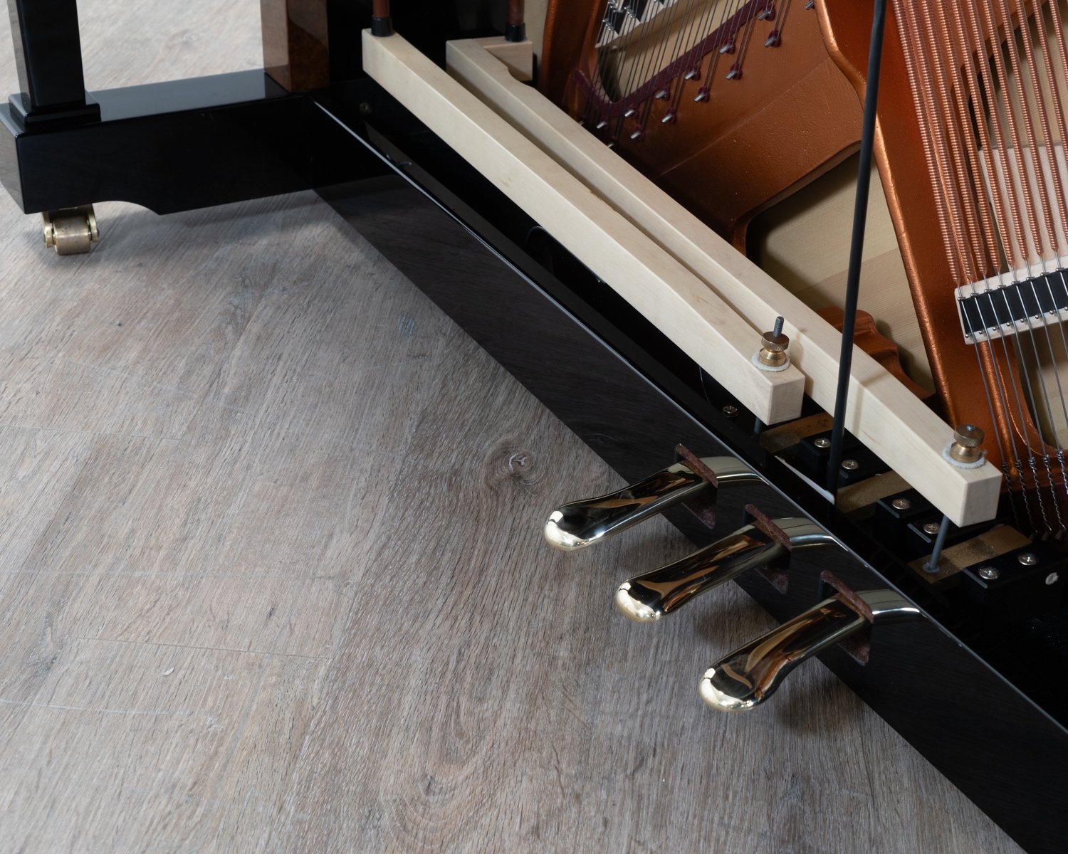 Bosendorfer 130 upright piano in polished black with burr walnut