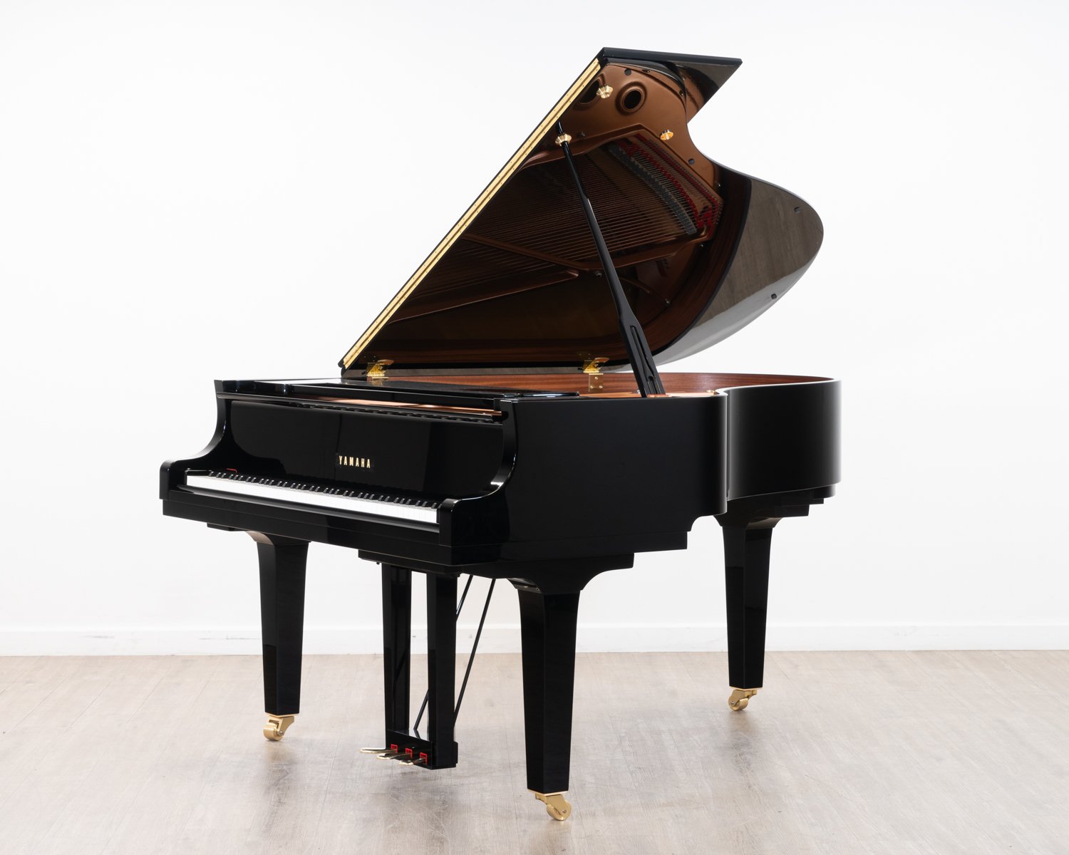 Yamaha C3X grand piano in polished black