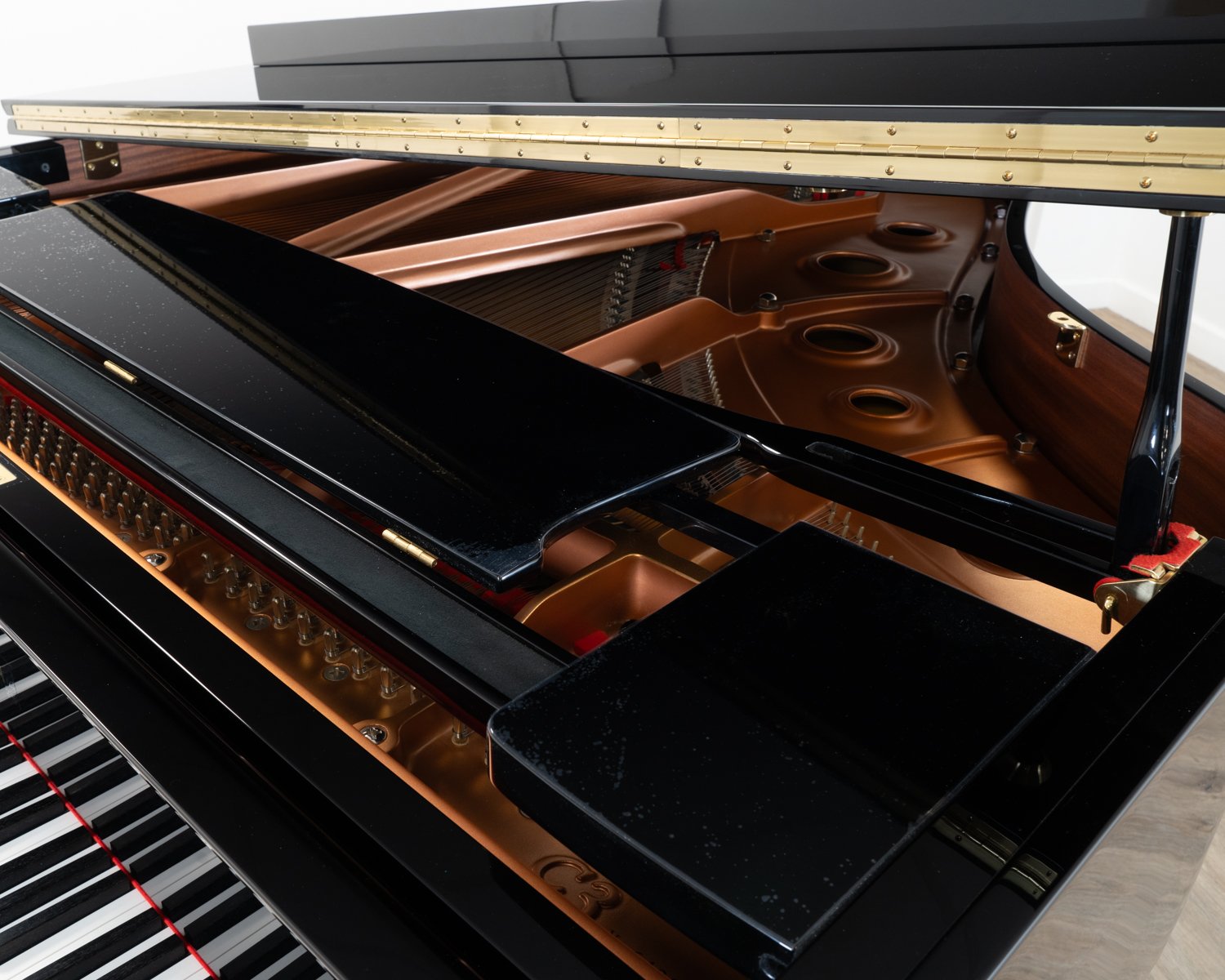 Yamaha C3X grand piano in polished black